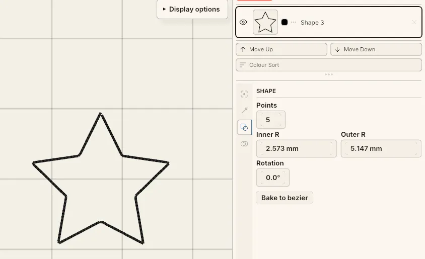 A star shape selected on the canvas with its Shape section open in the side panel.